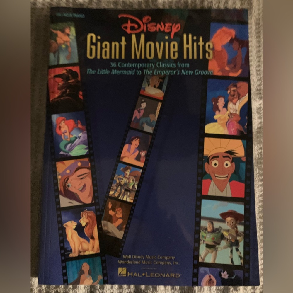 Disney Giant Movie Hits Songbook containing 36 Classics in Nearly New Condition